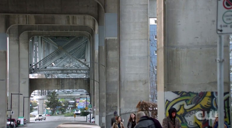 Look at the incredible architecture in the composition of this shot; a lesser director would be close on the two characters; Mr. Bee shoots it Nolan-style, with the surroundings as character